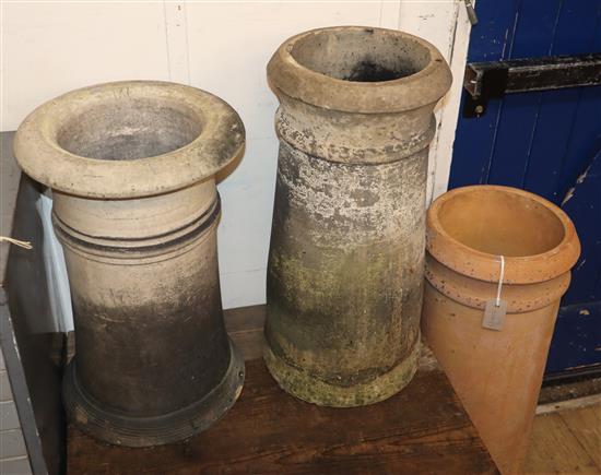 Three pottery chimney pots Tallest 78cm